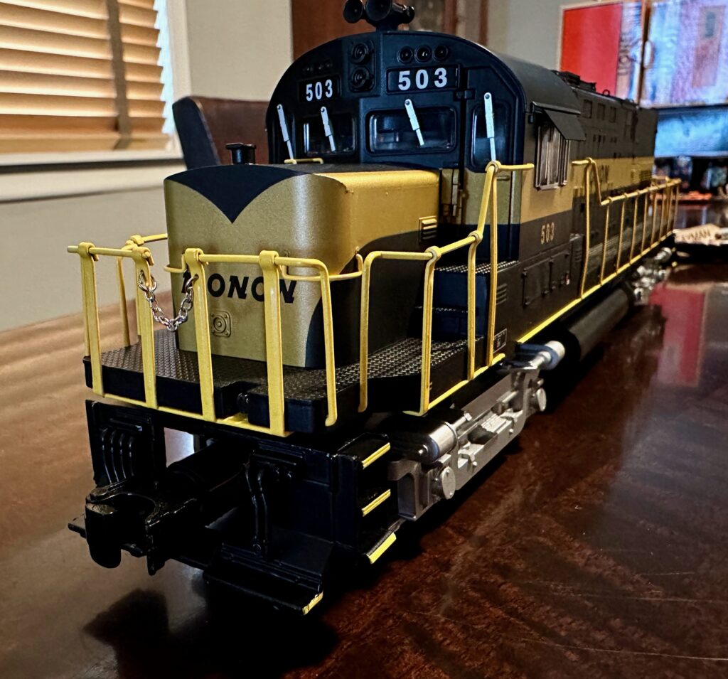 Front view of of O scale model of Monon ALCO Century 420 locomotive.