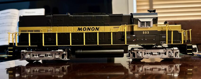 Side view of of O scale model of Monon ALCO Century 420 locomotive.